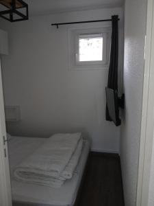 Appartement chaleureux.客房内的一张或多张床位