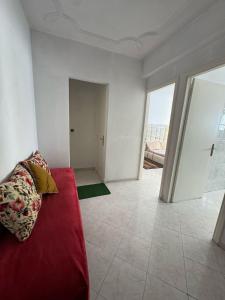 Un pat sau paturi într-o cameră la Appartement Dadi