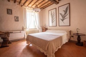 Postel nebo postele na pokoji v ubytování Guesthouse da Idolina dal 1946