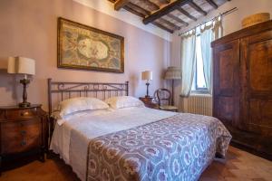 Postel nebo postele na pokoji v ubytování Guesthouse da Idolina dal 1946