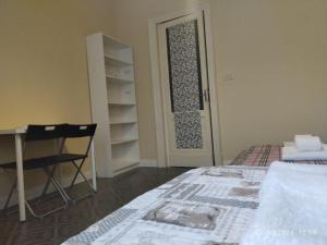 A bed or beds in a room at San Berillo house