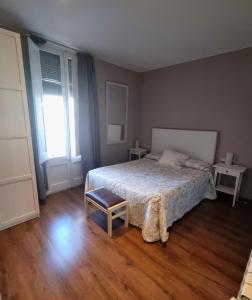 A bed or beds in a room at Apartment Sant Francesc