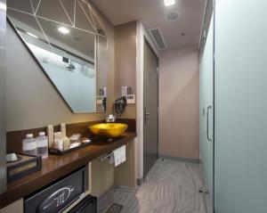 Ein Badezimmer in der Unterkunft Hotel Clover 7