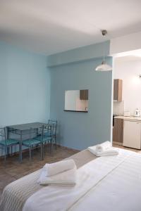 Posteľ alebo postele v izbe v ubytovaní Crystal Blue Hotel, Barbati