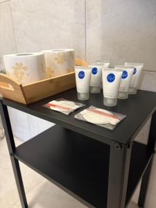 a table with a bunch of cups on it at Quattro Venti city suites in Rome +54 photos