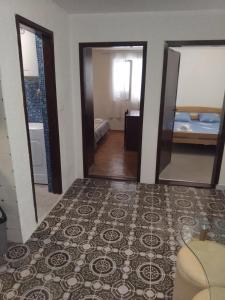 Postel nebo postele na pokoji v ubytování Apartments Vuk&Jovan