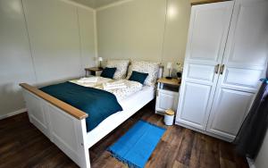 Postel nebo postele na pokoji v ubytování Csoda Apartman