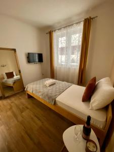 Posteľ alebo postele v izbe v ubytovaní Apartments Adaleta