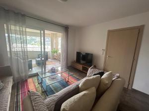 TV a/nebo společenská místnost v ubytování Superbe t2 route de ville Bastia