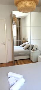 Katil atau katil-katil dalam bilik di Apartman Cozy