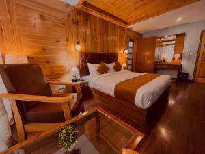 Postelja oz. postelje v sobi nastanitve Vista Resort - Centrally Heated & Air Cooled Near Mall road Manali