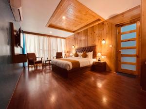 Postelja oz. postelje v sobi nastanitve Vista Resort - Centrally Heated & Air Cooled Near Mall road Manali