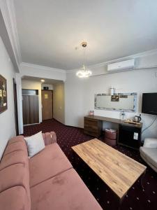 Postel nebo postele na pokoji v ubytování Hotel Topkapı