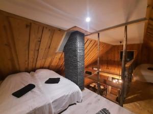 Postel nebo postele na pokoji v ubytování Jürivärava Saunamaja + 19 fotografií