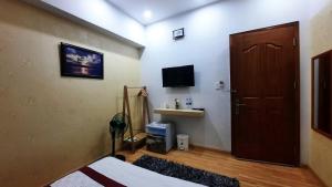 TV a/nebo společenská místnost v ubytování NEST House