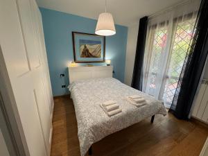 Ένα ή περισσότερα κρεβάτια σε δωμάτιο στο Oasi di relax tra Firenze e colline del Chianti