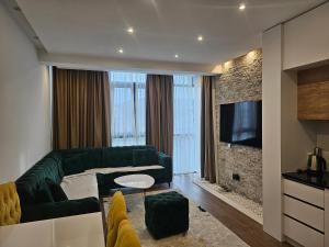 TV a/nebo společenská místnost v ubytování Moon Apartment + 2 fotografie