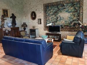 Χώρος καθιστικού στο Gîte de charme aux portes de Périgueux