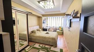Ένα ή περισσότερα κρεβάτια σε δωμάτιο στο Casa de Familya