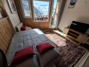 TV a/nebo společenská místnost v ubytování Studio au coeur d'Avoriaz - 4 pers - vue splendide