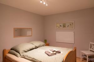 Letto o letti in una camera di Seepark Weiden - Baumhof