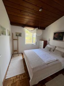 Postel nebo postele na pokoji v ubytování Vacation Family House on the Beach
