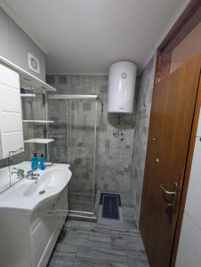 Koupelna v ubytování NiceOneLakeView