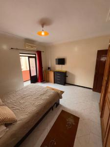 Postel nebo postele na pokoji v ubytování Belle Chambre Dans Une Villa