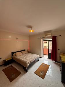 Postel nebo postele na pokoji v ubytování Belle Chambre Dans Une Villa