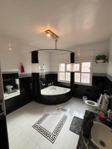 Postel nebo postele na pokoji v ubytování Belle Chambre Dans Une Villa