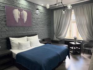 Postel nebo postele na pokoji v ubytování Residence IRON CUBE