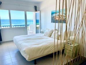 Postel nebo postele na pokoji v ubytování Weybeach3 ocean frontline,sea view,private terrace