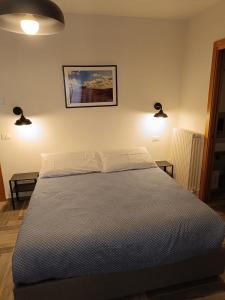 Letto o letti in una camera di Il Rifugio del Borgo