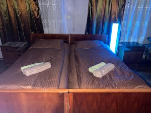 Postel nebo postele na pokoji v ubytování Hostel Ozurgeti + 15 fotografií