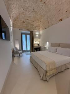 Postel nebo postele na pokoji v ubytování La Volta