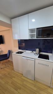 Kuchyň nebo kuchyňský kout v ubytování Orbi City Sea View Aparthotel