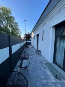 a row of benches on the side of a building at Bungalow Modern Living in Memmingen