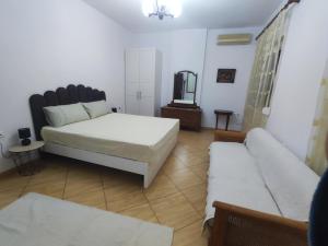Postel nebo postele na pokoji v ubytování Villa ILIRIAN