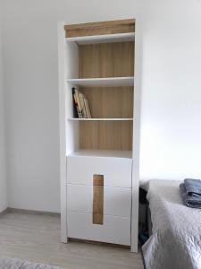 Postel nebo postele na pokoji v ubytování Apartament Konarskiego + 17 fotografií