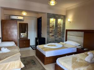 Postel nebo postele na pokoji v ubytování Sunset Luxury Dahab