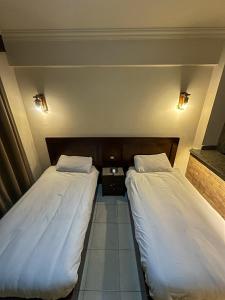 Postel nebo postele na pokoji v ubytování Sunset Luxury Dahab