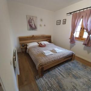 Postel nebo postele na pokoji v ubytování Fruška house