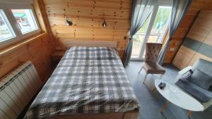 Voodi või voodid majutusasutuse VIP Durmitor toas