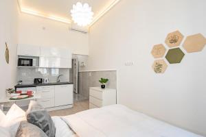 Kuchyň nebo kuchyňský kout v ubytování Super Central - NEW - Comfy Studio