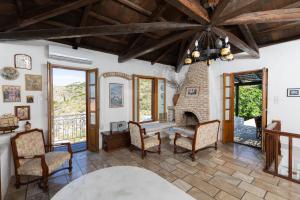 Χώρος καθιστικού στο Villa Emilia