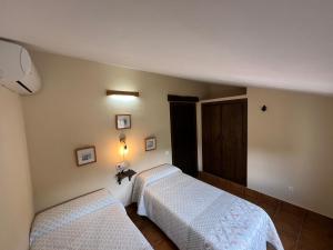 A bed or beds in a room at Dúplex Río Madera