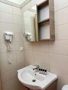 Koupelna v ubytování Serenity home + 11 fotografií