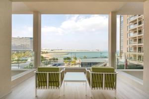 Een balkon of terras bij Agora, Doha, Autograph Collection