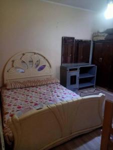 Tempat tidur dalam kamar di الموقر هوستل