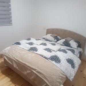 Ένα ή περισσότερα κρεβάτια σε δωμάτιο στο DeLux Apartment Helena 2